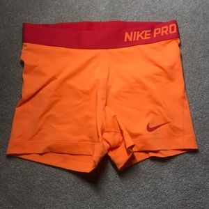 Neon orange Nike spandex